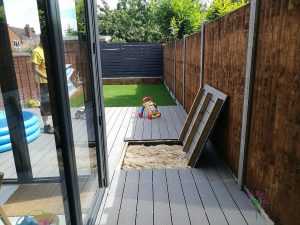 Deckinn with built in sand pit